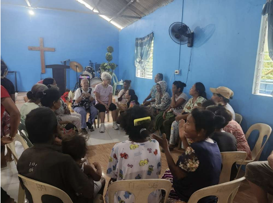 Community members gathered inside Jean Chapel